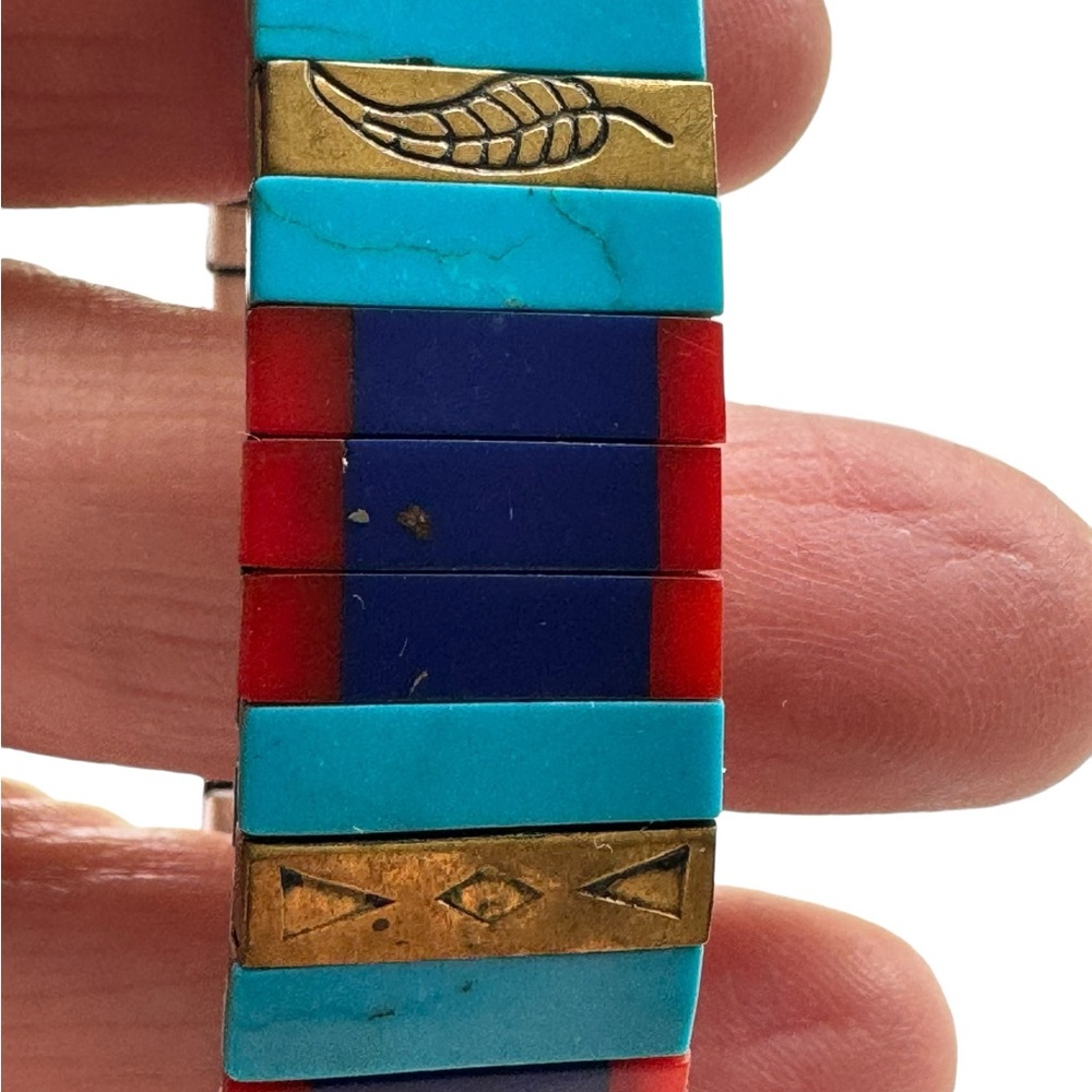 Vintage Native American inlaid stretch bracelet in turquoise, blue and coral.